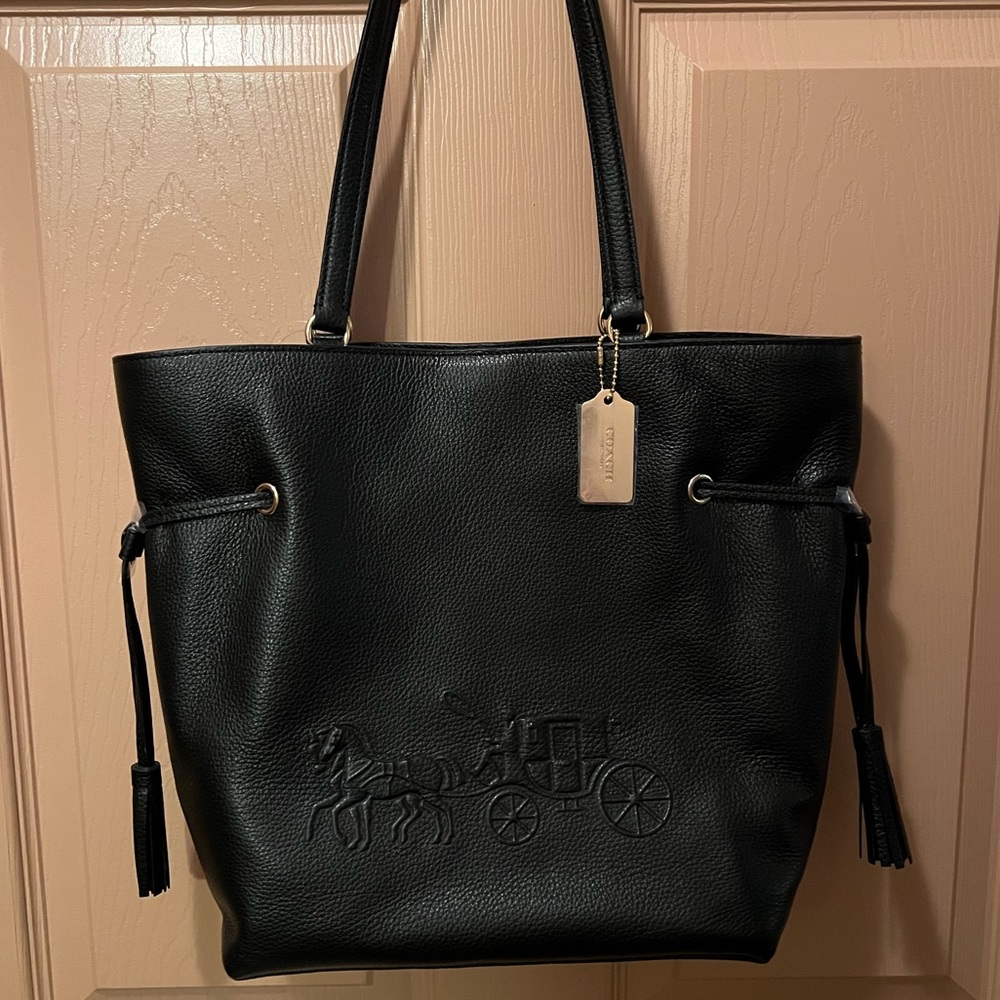Beautiful Coach Tote , black with gold hardware, new with tags
